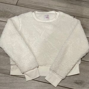 White fuzzy sweater